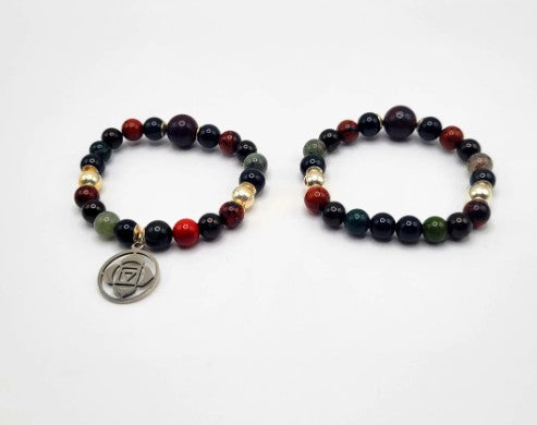 Root chakra bracelet with rainbow obsidian, bloodstone, and jet beads, grounding healing crystal jewelry for spiritual energy.