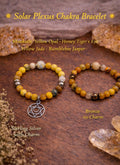 Solar Plexus chakra bracelets with yellow gemstones, sterling silver charm and bronze, on wood