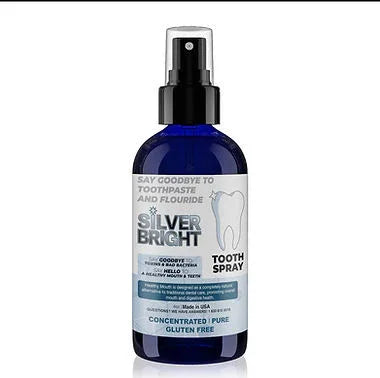Blue bottle labeled Silver Bright Tooth Spray for oral care, fluoride-free, gluten free.