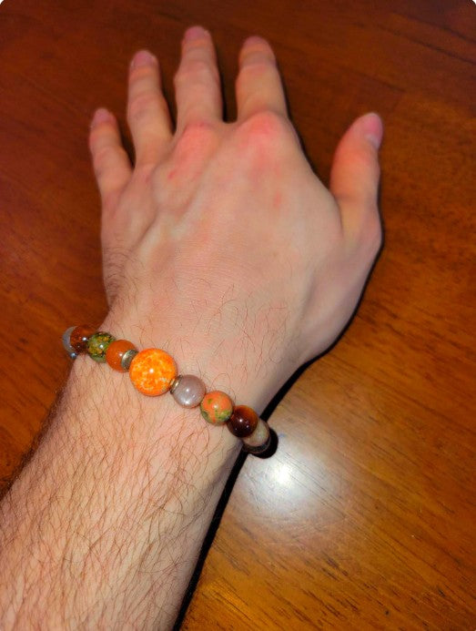 Sacral Chakra bracelet with AAA brown moonstone, imperial jasper, orange moonstone, and sterling silver beads.