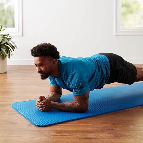 Old World Hub Amazon Basics extra thick yoga mat with carrying strap, showing textured surface and secure strap for easy transport.