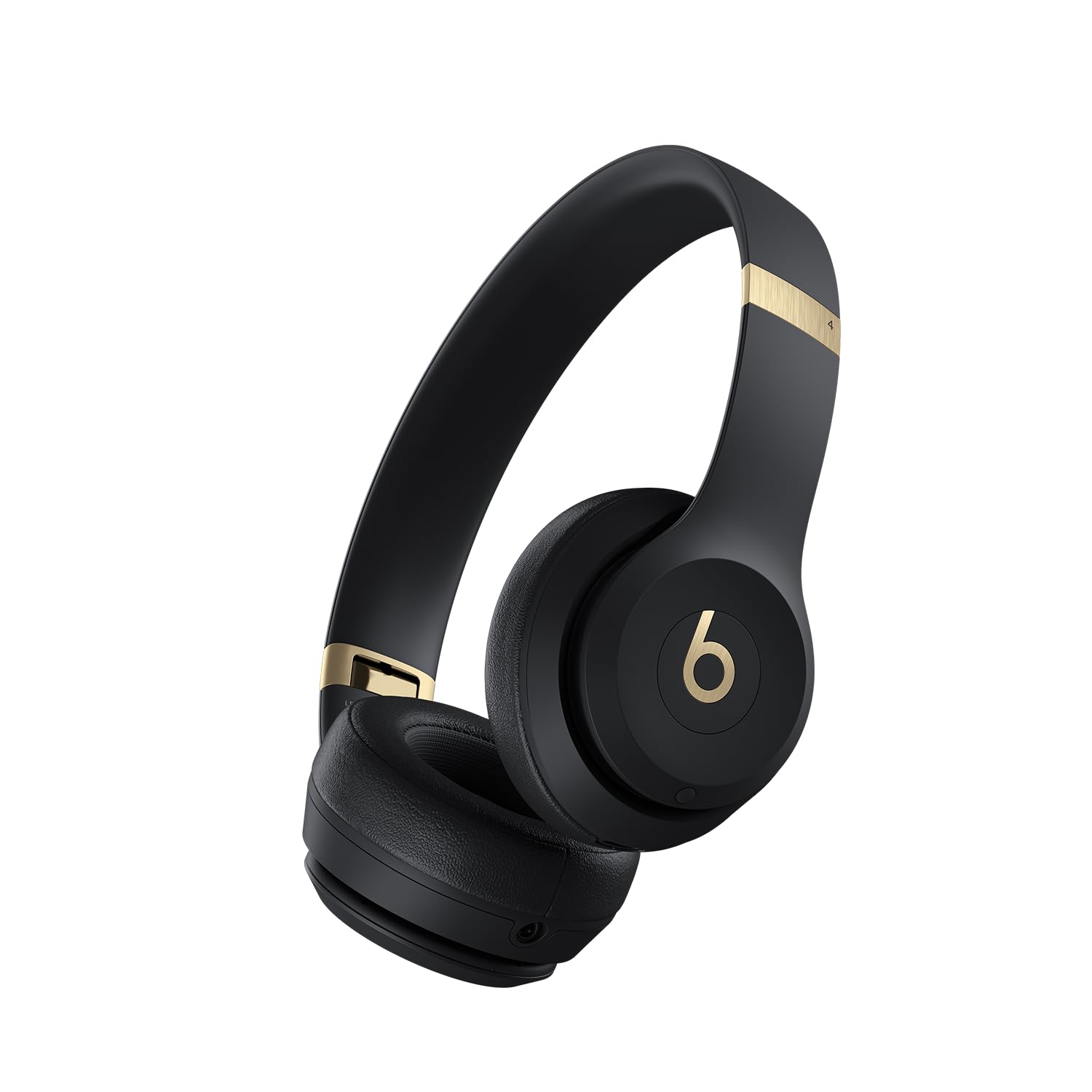 Beats Solo 4 wireless on-ear Bluetooth headphones in black and gold, showing the sleek design and cushioned ear cups.