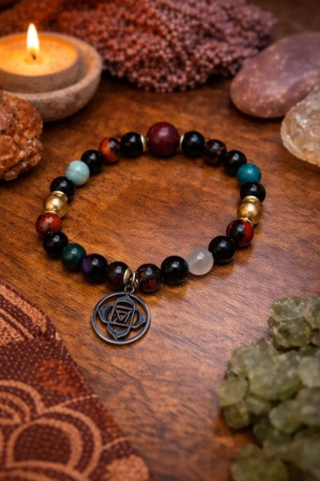 Root Chakra bracelet with rainbow obsidian, blood stone, and jet beads, grounding healing energy jewelry for women.