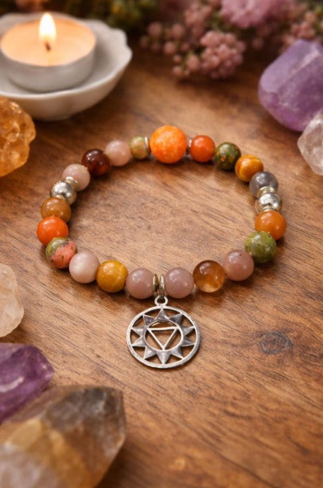 Sacral Chakra bracelet with AAA brown moonstone, imperial jasper, orange moonstone, and sterling silver beads.