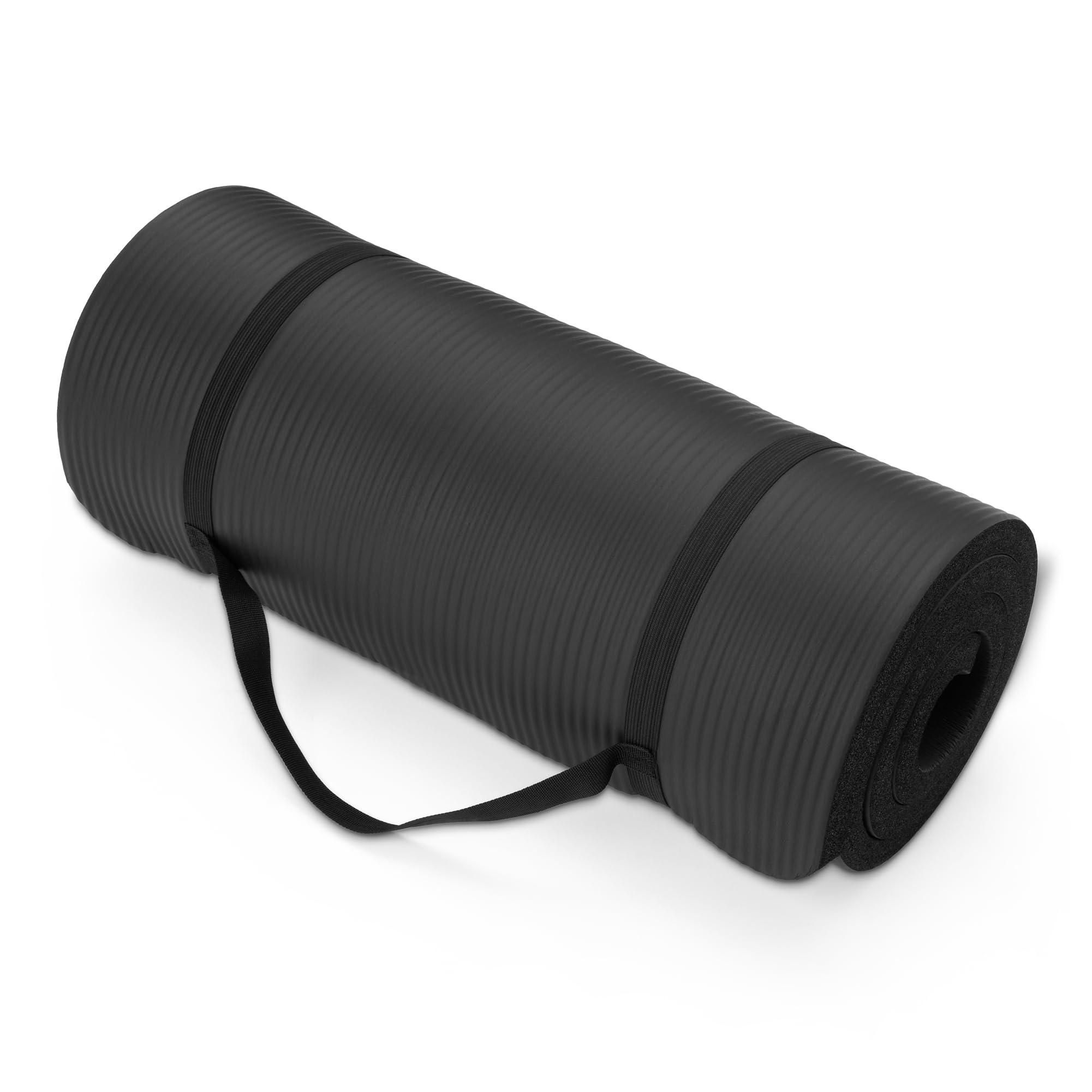 Old World Hub Amazon Basics extra thick exercise yoga mat with carrying strap laid flat on a wooden floor