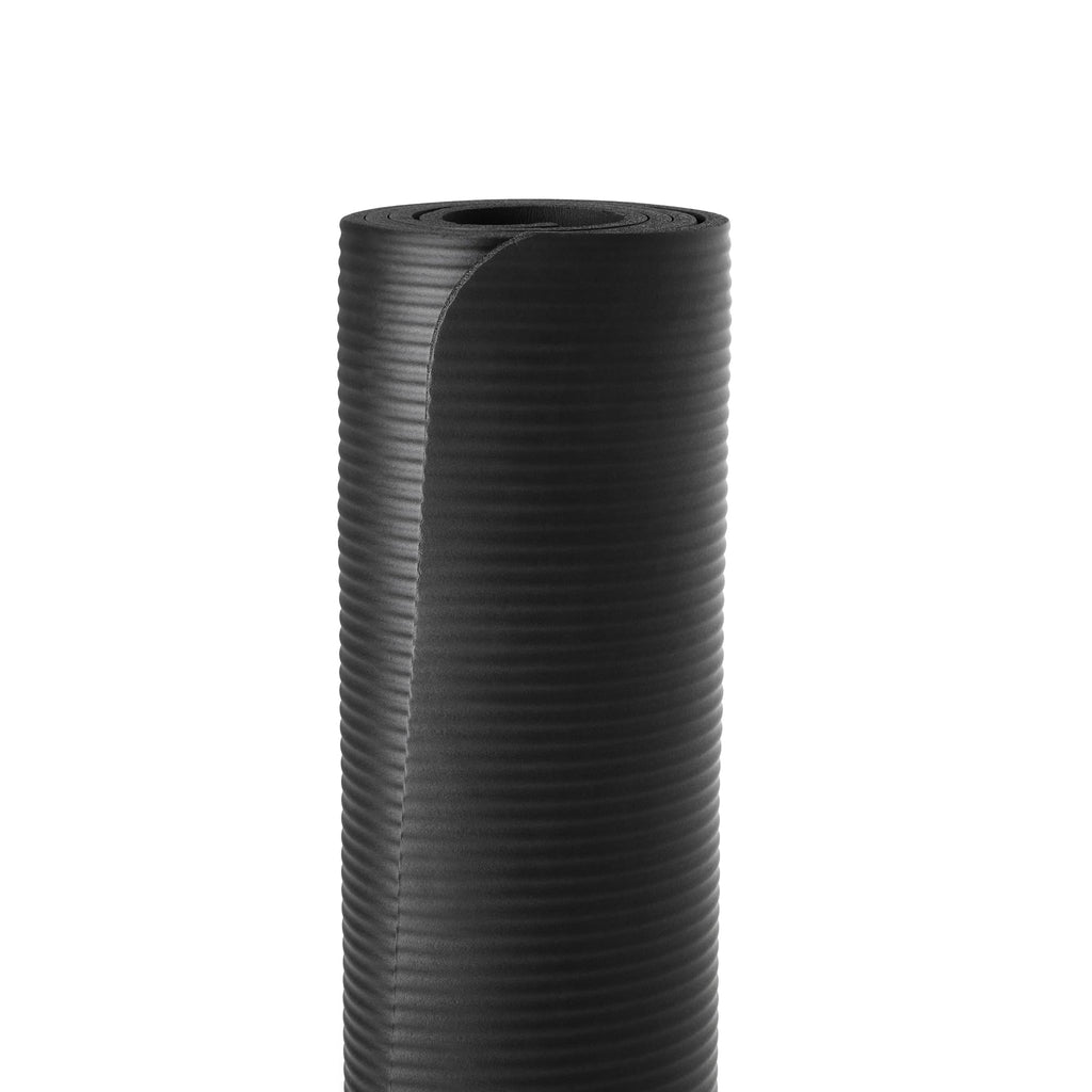 Old World Hub Amazon Basics extra thick exercise yoga mat with carry strap, showing textured surface and rolled-up design.