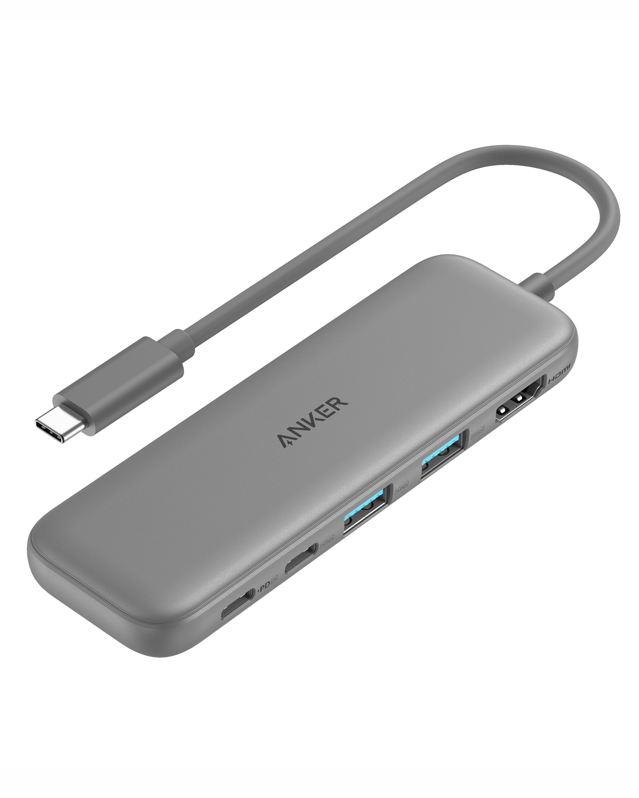 Anker 5-in-1 USB C hub with HDMI 4K port and USB-A data ports, connected to a laptop, in green color, showcasing multiple device connections.