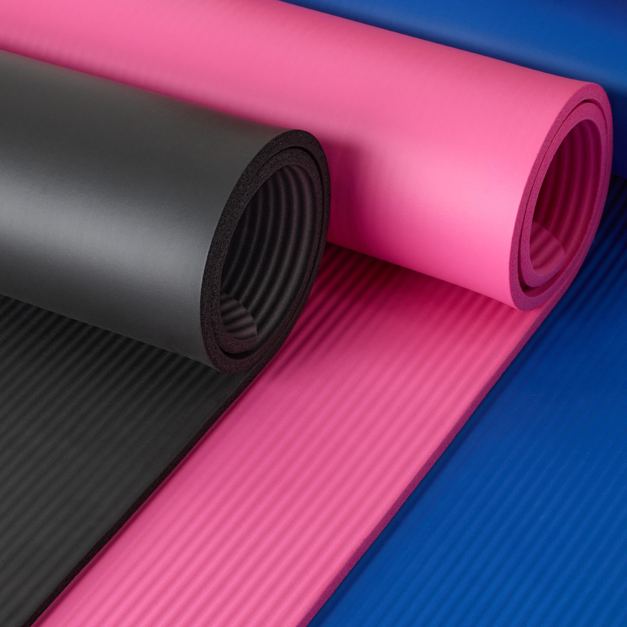 Old World Hub Amazon Basics extra thick yoga mat with carrying strap, showing textured surface for comfort and grip during exercise.
