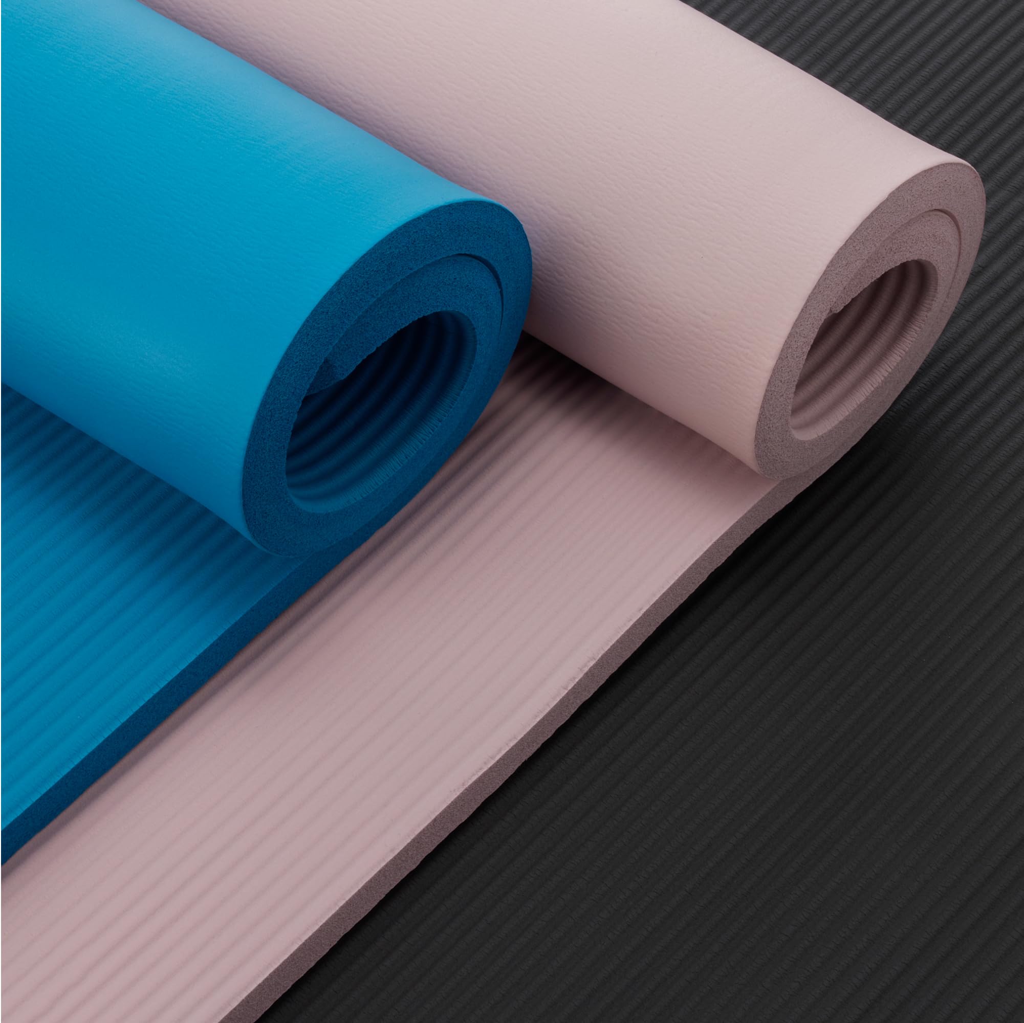Old World Hub Amazon Basics extra thick exercise yoga mat with carrying strap, showing textured surface for yoga practice.