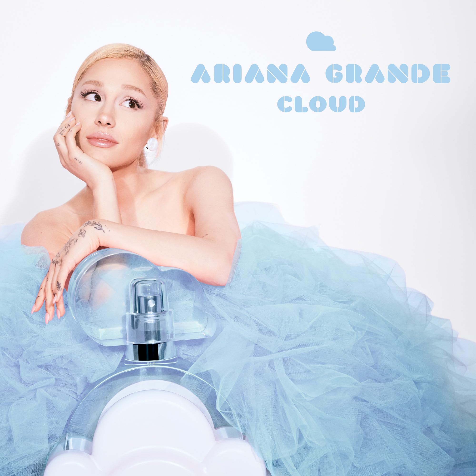 Ariana Grande Cloud Eau de Parfum bottle featuring warm gourmand fragrance with lavender, coconut, vanilla, and pear notes.