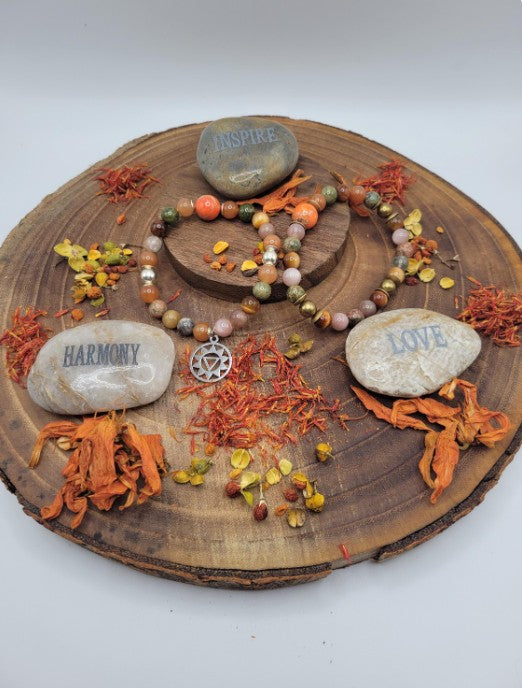 Sacral Chakra bracelet featuring AAA brown moonstone, imperial jasper, orange moonstone, and sterling silver beads.