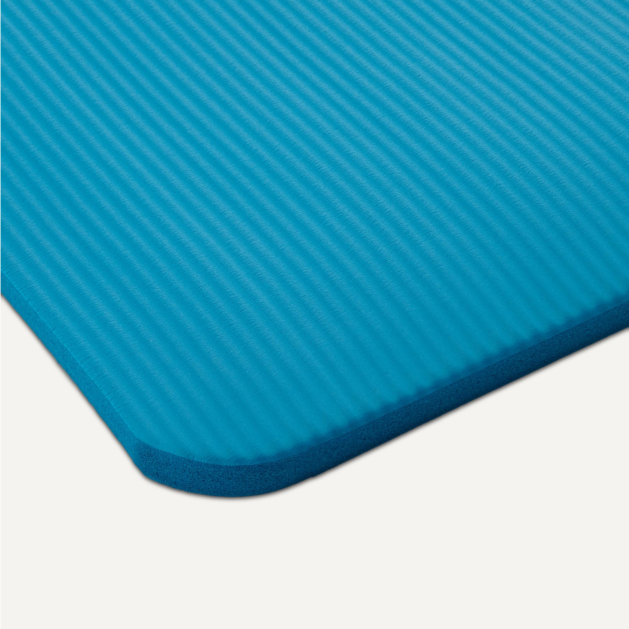Old World Hub Amazon Basics extra thick yoga mat with carrying strap, showing textured surface and rolled-up design for exercise use.
