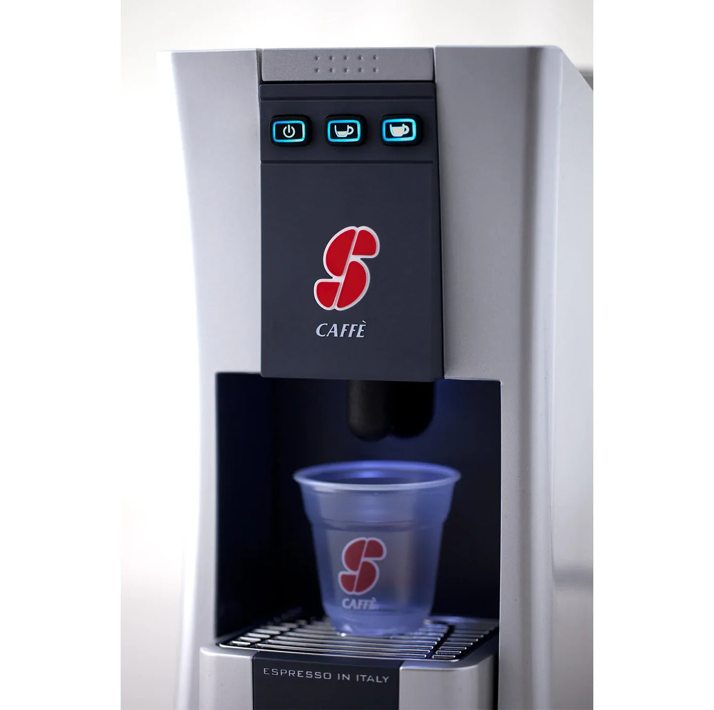 Modern espresso coffee machine with branded cup and illuminated control buttons